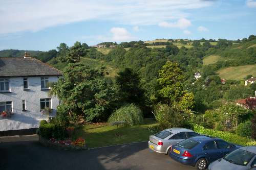 on the left Langly house.